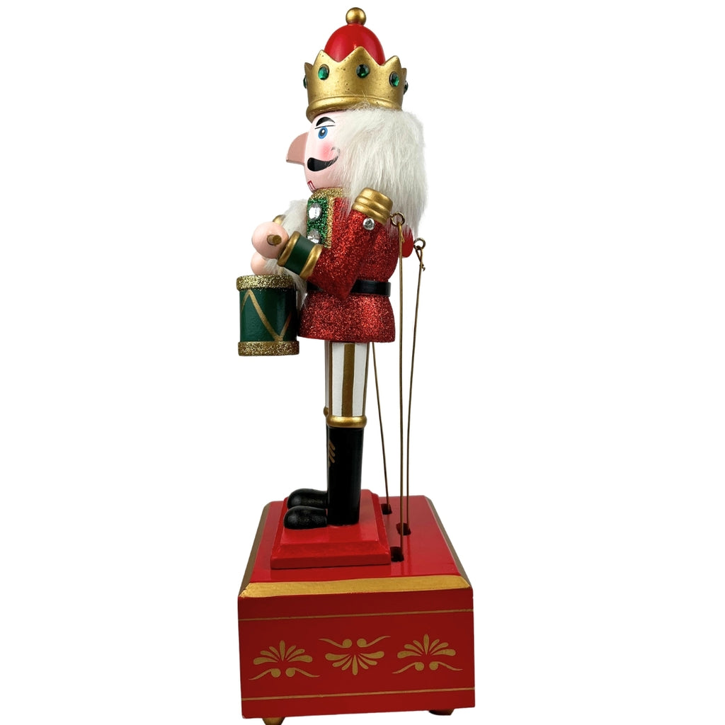 Cascanuez con caja de música rojo 32cm