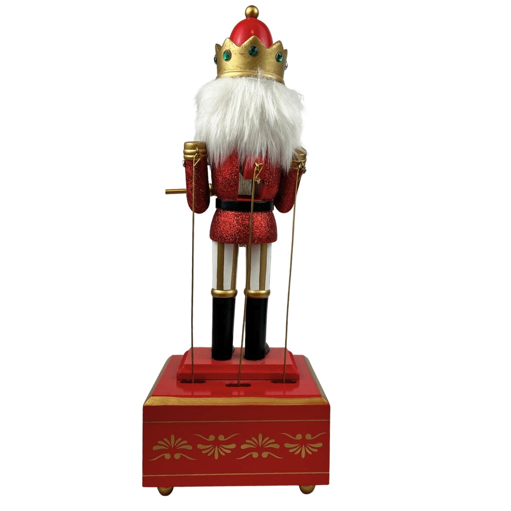 Cascanuez con caja de música rojo 32cm