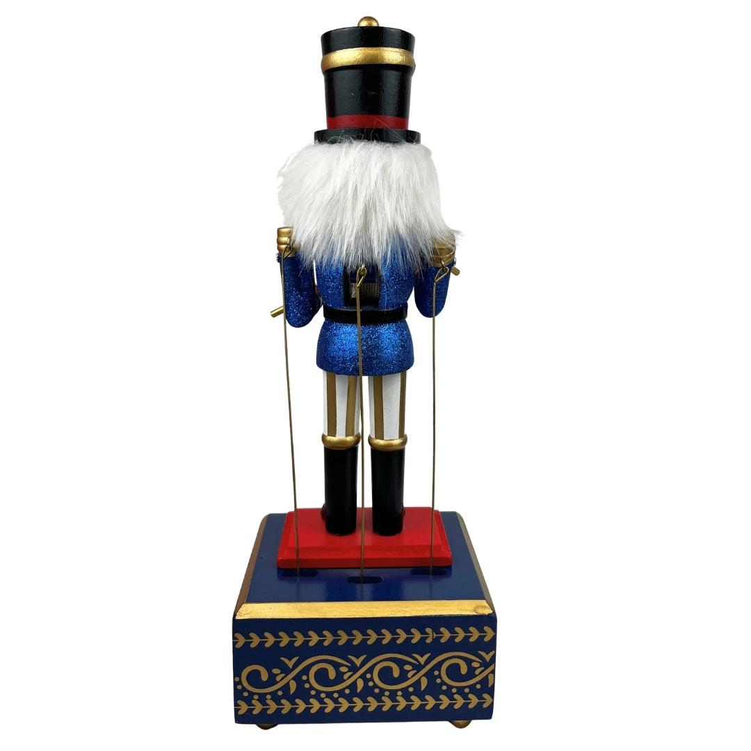 Cascanuez con caja de música azul  32cm