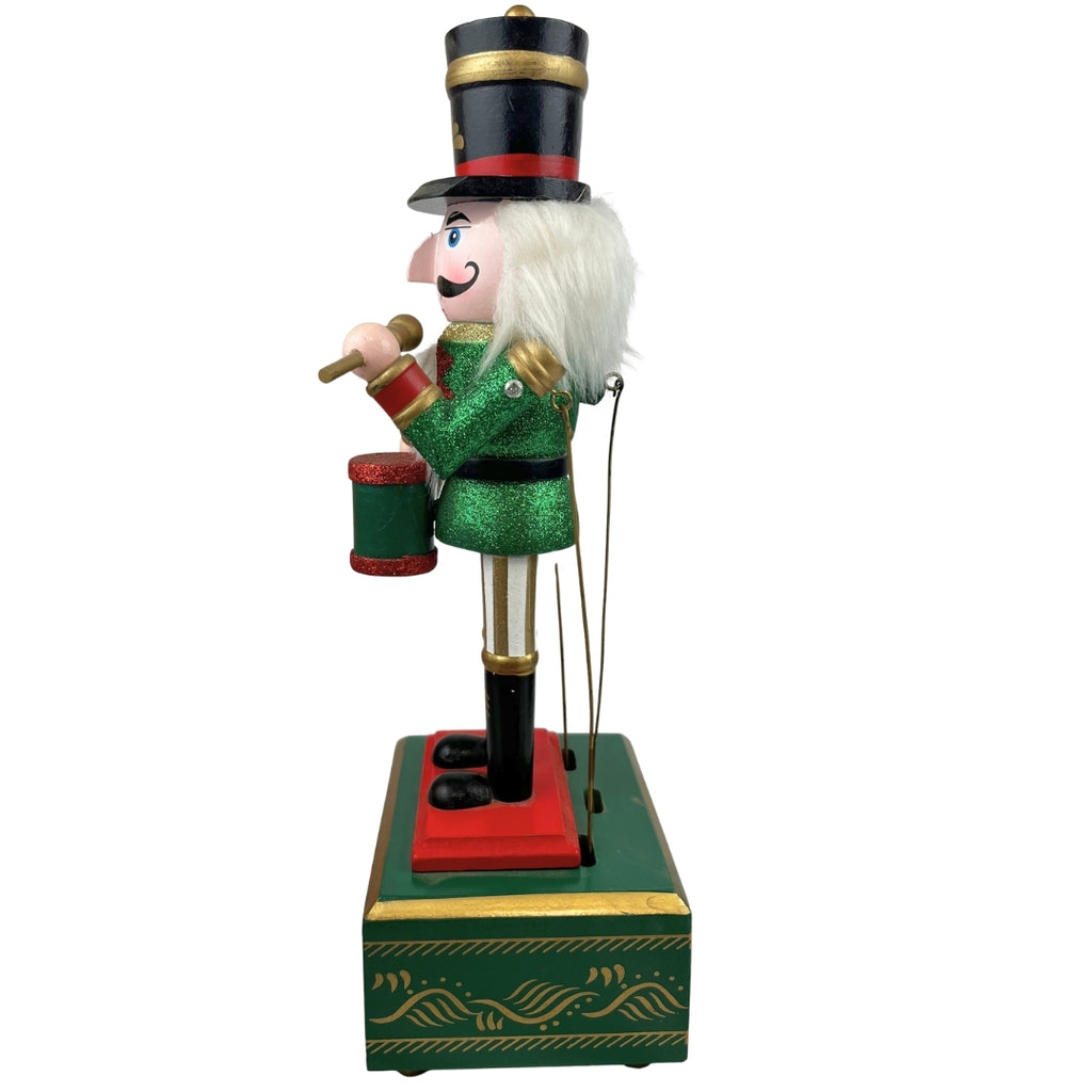 Cascanuez con caja de música verde 32cm