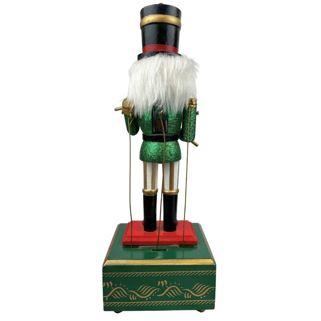 Cascanuez con caja de música verde 32cm