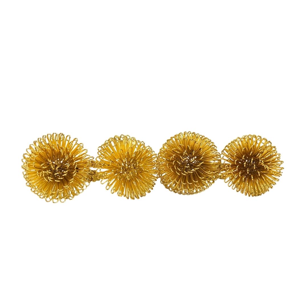 Juego de anillos de flor dorada