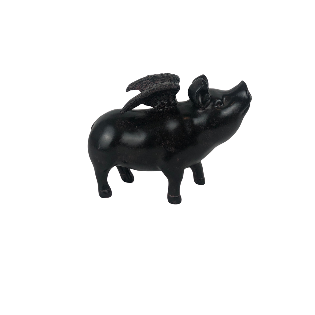 Figura cerdito alas