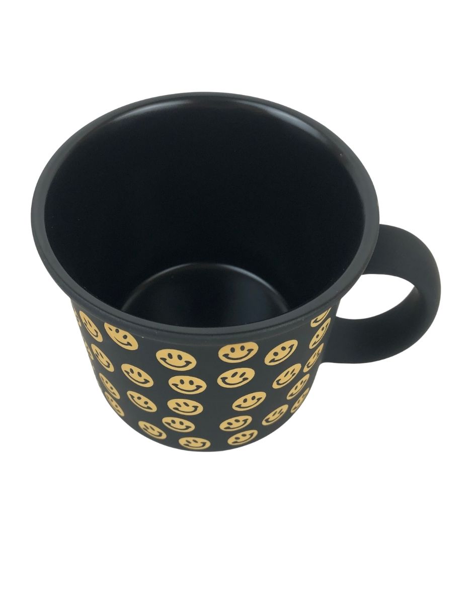 Taza de caras sonrientes